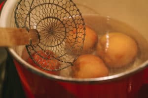 peeling peaches in boiling water