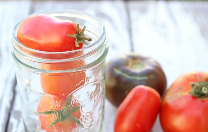 preserving tomatoes by canning, freezing, or drying