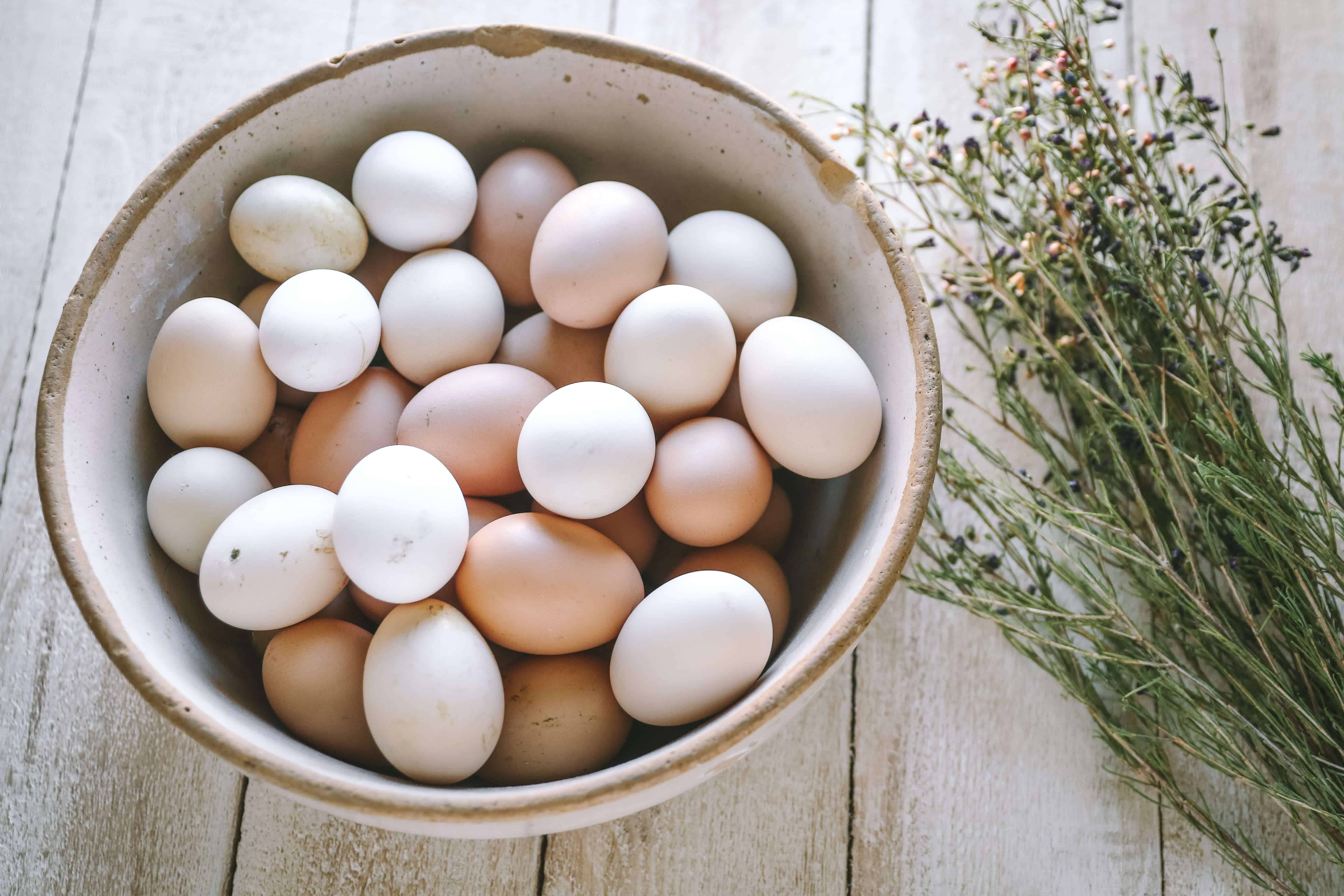 fresh eggs in old bowl