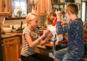 Homesteading with Kids Making Tomato Sauce